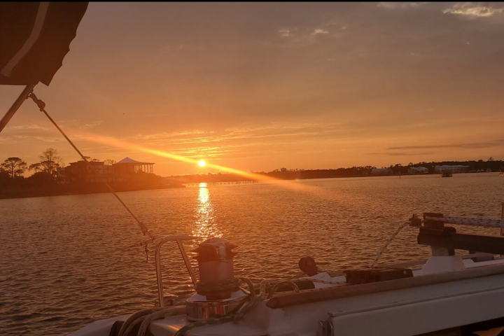 a sunset over a body of water