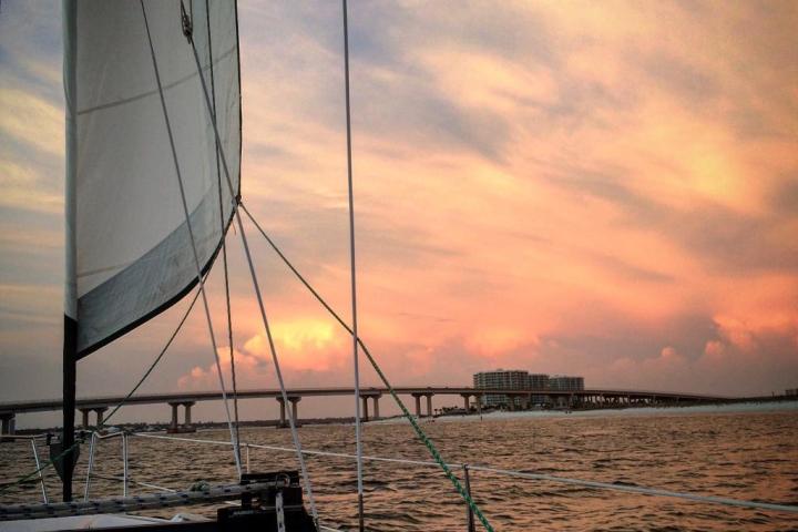 a boat is docked next to a body of water